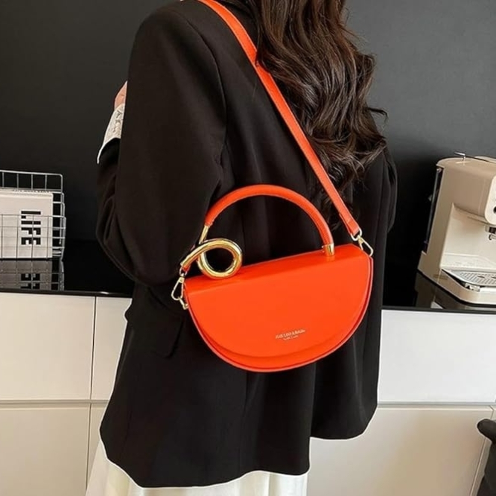 Trendy orange crossbody shoulder bag – modern crescent handbag